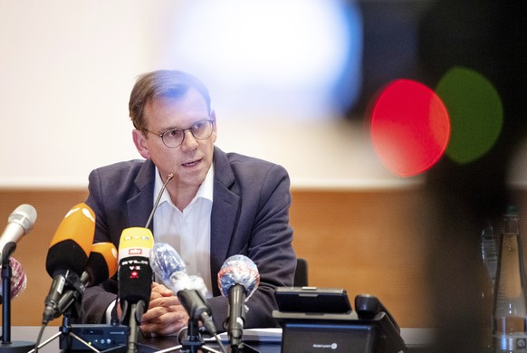 Thomas Kuhlbusch, head of the crisis management team and head of the Health, Order and Law Department of the Guetersloh district, takes part in a press conference in Rheda-Wiedenbrueck, Germany, Wedne ...
