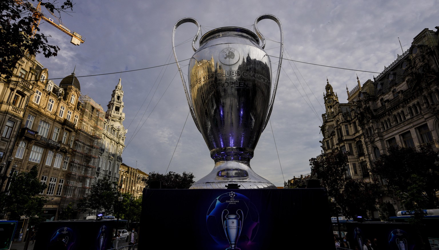 A giant replica of the UEFA Champions League trophy is displayed in Porto, Portugal, Thursday, May 27, 2021. Manchester City will play against Chelsea in the Champions League final on Saturday. (AP Ph ...