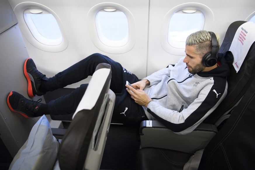 Switzerland&#039;s national team soccer player Valon Behrami is pictured in a plane at the EuroAirport Basel Mulhouse Freiburg, in Basel, Switzerland, Tuesday, November 7, 2017. Switzerland will face  ...