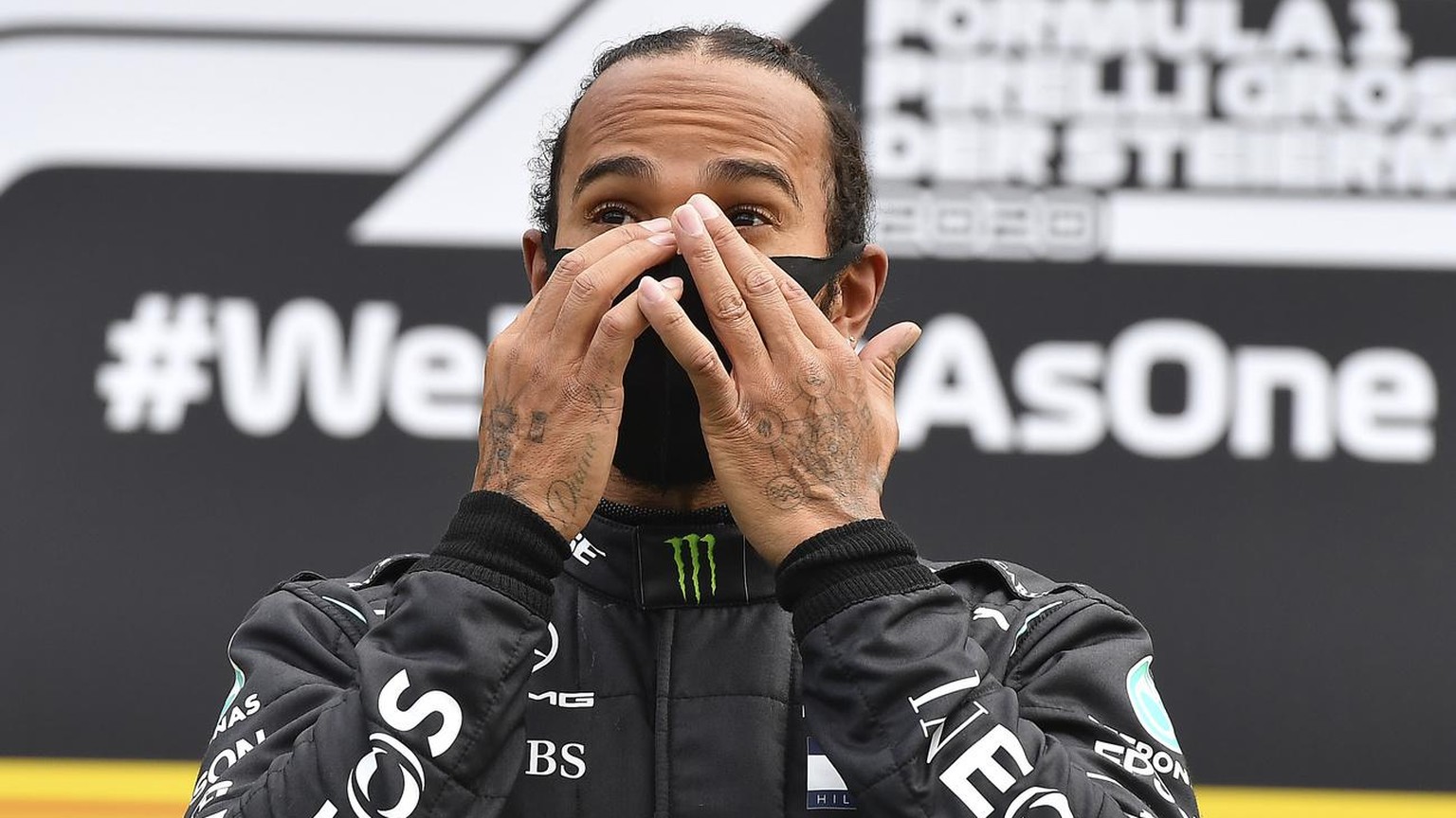 Mercedes driver Lewis Hamilton of Britain celebrates on the podium after winning the Styrian Formula One Grand Prix at the Red Bull Ring racetrack in Spielberg, Austria, Sunday, July 12, 2020. (Joe Kl ...