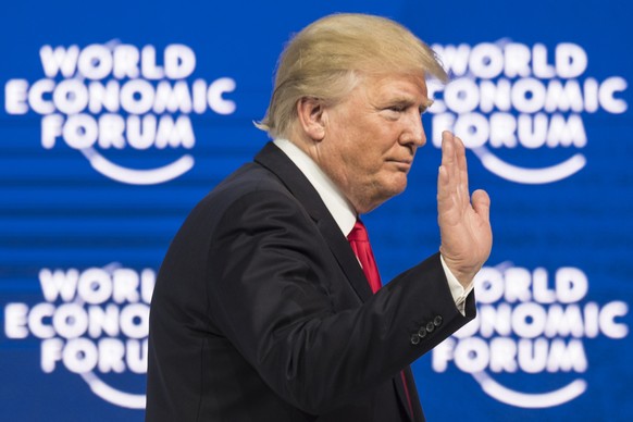 Donald Trump, President of the United States of America, gestures after adressing a plenary session during the 48th Annual Meeting of the World Economic Forum, WEF, in Davos, Switzerland, Friday, Janu ...