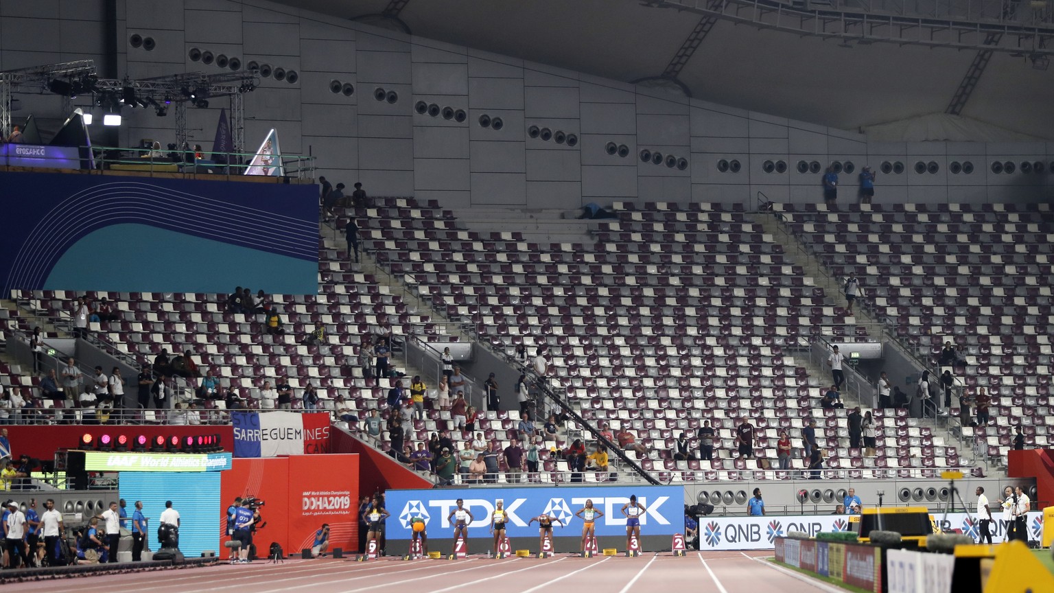 Empty seats before the the women&#039;s 100 meter final at the World Athletics Championships in Doha, Qatar, Sunday, Sept. 29, 2019. (AP Photo/Petr David Josek)