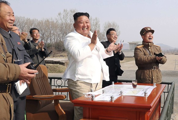 FILE - In this undated file photo provided by the North Korean government on April 12, 2020, North Korean leader Kim Jong Un inspects an air defense unit in the western area, of North Korea. North Kor ...