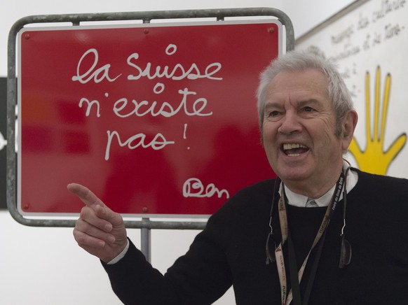 epa04985133 Swiss-French artist, performer and linguistic inventor Ben Vautier poses next to his artwork consisting of the message &#039;la Suisse n&#039;existe pas&#039; (Switzerland does not exist)  ...