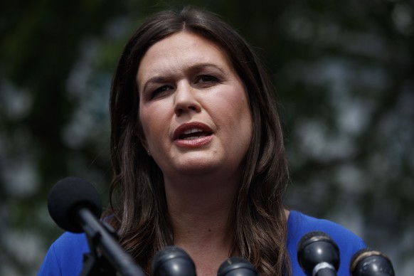 White House press secretary Sarah Sanders speaks with reporters outside the White House, Friday, May 3, 2019, in Washington. (AP Photo/Evan Vucci)