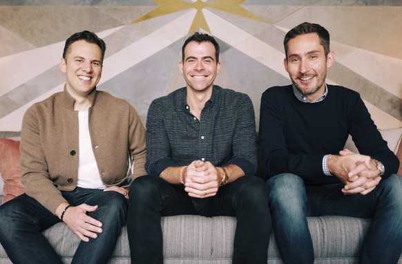 In this undated photo provided by Instagram/Facebook Inc. Adam Mosseri, center, poses for a photo with Instagram co-founders Kevin Systrom, right, and Mike Krieger. Facebook says it has named Mosseri, ...
