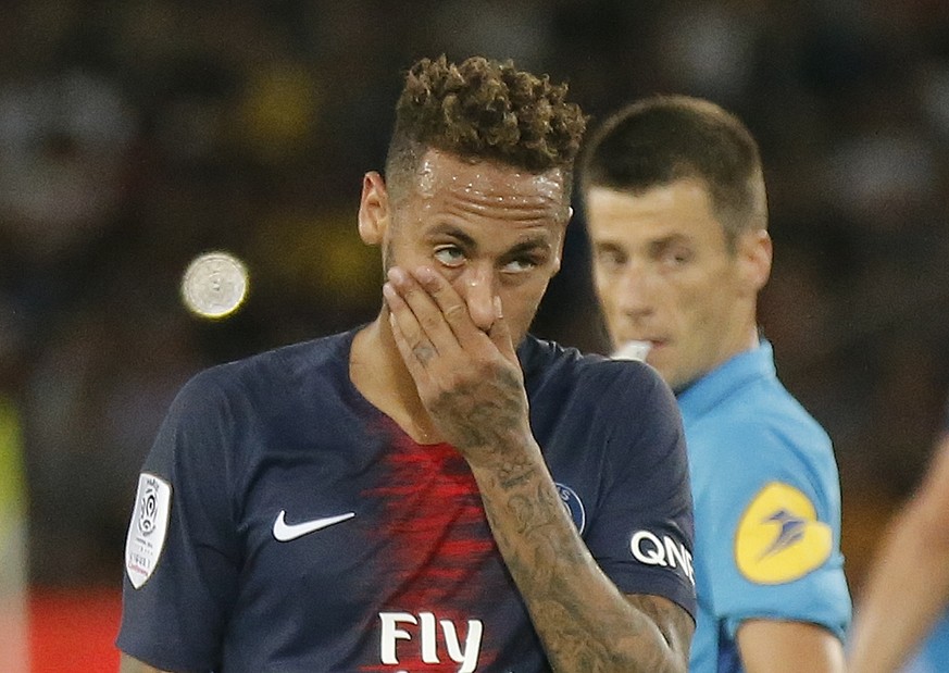 FILE - In this Aug.12 2018 file photo, PSG&#039;s Neymar reacts during a League One soccer match between Paris Saint-Germain and Caen at Parc des Princes stadium in Paris. Paris Saint-Germain striker  ...