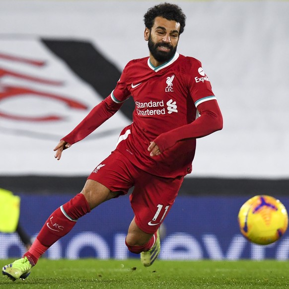 epa08882157 Mohamed Salah of Liverpool in action during the English Premier League soccer match between Fulham FC and Liverpool FC in London, Britain, 13 December 2020. EPA/Neil Hall / POOL EDITORIAL  ...