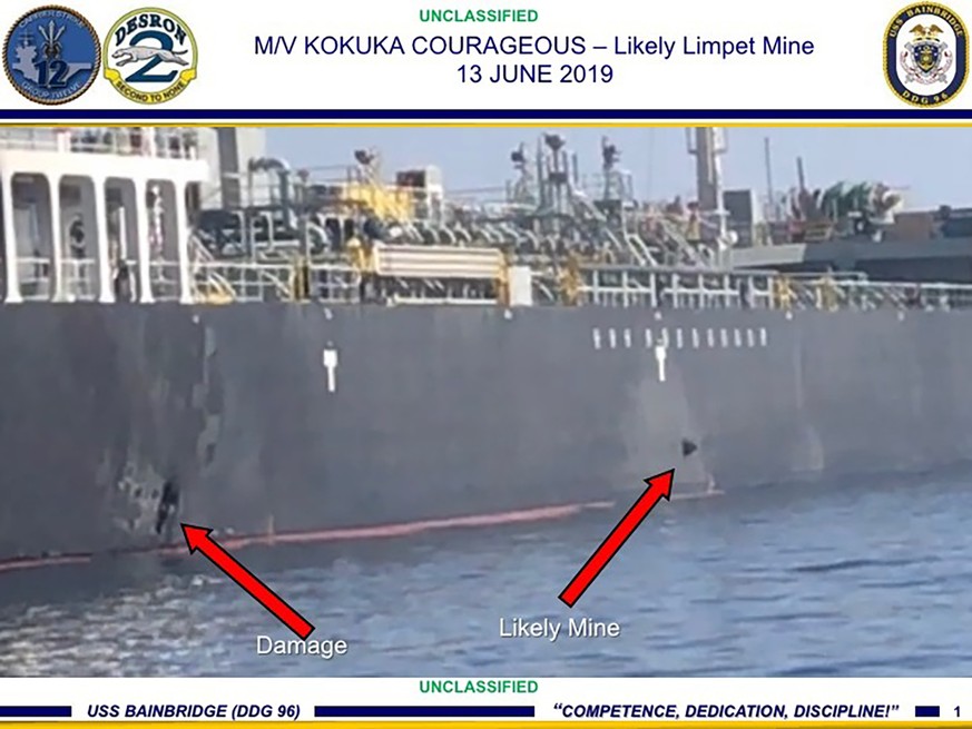 This June 13, 2019, image released by the U.S. military&#039;s Central Command, shows damage and a suspected mine on the Kokuka Courageous in the Gulf of Oman near the coast of Iran. The U.S. military ...