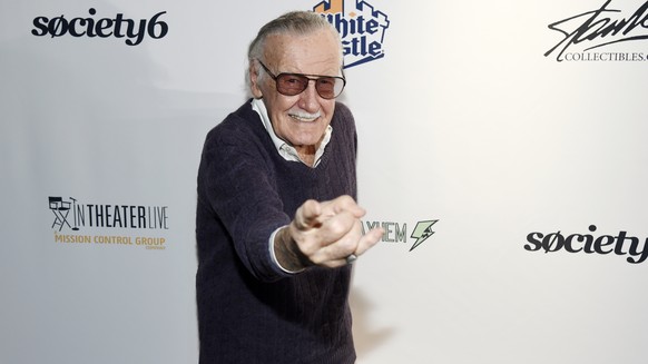Comic book writer Stan Lee strikes a &quot;Spider-Man&quot; pose at the &quot;Extraordinary: Stan Lee&quot; tribute event at the Saban Theatre on Tuesday, Aug. 22, 2017, in Beverly Hills, Calif. (Phot ...