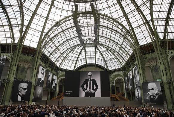 Photographes of late German fashion designer Karl Lagerfeld are displayed during the event named &quot;Karl for Ever&quot; at the Grand Palais in Paris, France, Thursday, June 20, 2019. The event pays ...
