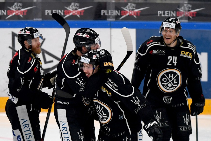 Lugano?s player Elia Riva center celebrate the 3 - 0 goal with team mate, during the preliminary round game of National League A (NLA) Swiss Championship 2019/20 between HC Lugano and ZSC Lions at the ...