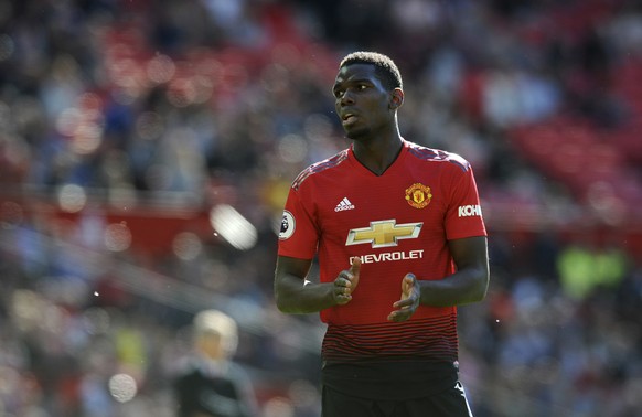 Manchester United&#039;s Paul Pogba applauds during the English Premier League soccer match between Manchester United and Cardiff City at Old Trafford in Manchester, England, Sunday, May 12, 2019. (AP ...