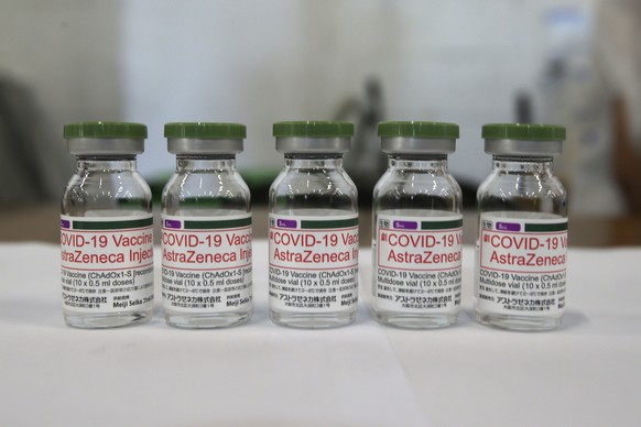 Five bottles of the AstraZeneca COVID-19 vaccine are placed at Songshan Cultural and Creative Park in Taipei, Taiwan, Wednesday, June 16, 2021. (AP Photo/Chiang Ying-ying)