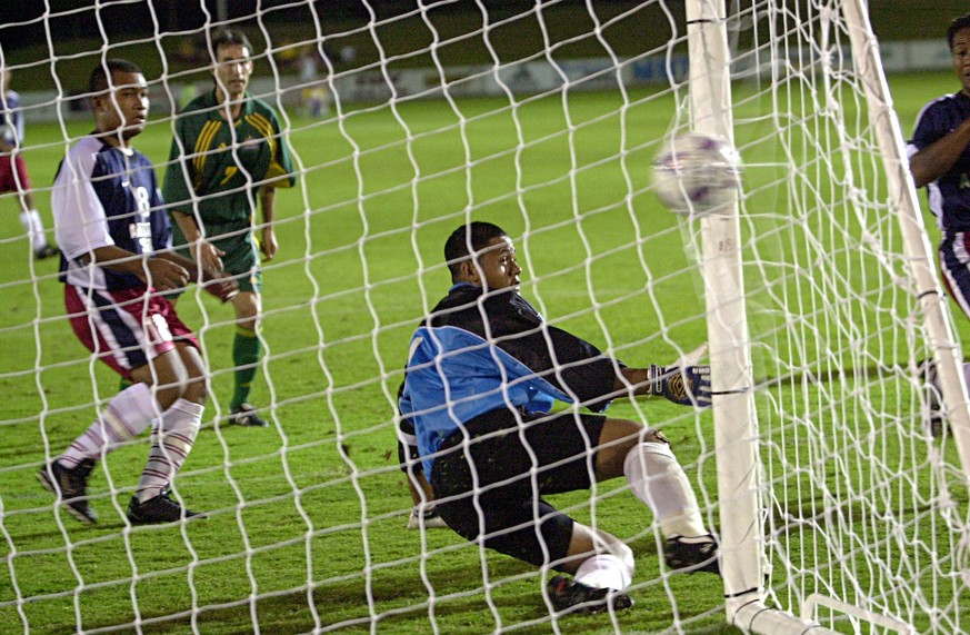 11 Apr 2001: Aurelio Vidmar #7 of the Socceroos gets a goal past Nicky Salapu #1 of American Samoa during the Oceania group one World Cup qualifier match between Australia and American Samoa played at ...