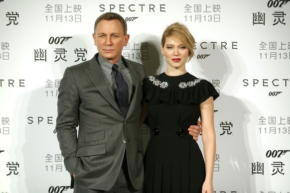 British actor Daniel Craig and French actress Lea Seydoux pose for photographers before a press conference for the movie &quot;Spectre&quot; in Beijing, Tuesday, Nov. 10, 2015. The film, the latest in ...