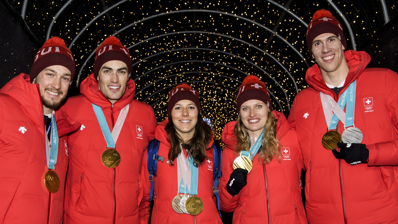Frome left to right, Luca Aerni, Daniel Yule, Wendy Holdener, Denise Feierabend, Ramon Zenhaeusern, pose at the House of Switzerland after the Alpine Skiing Team event during the XXIII Winter Olympics ...