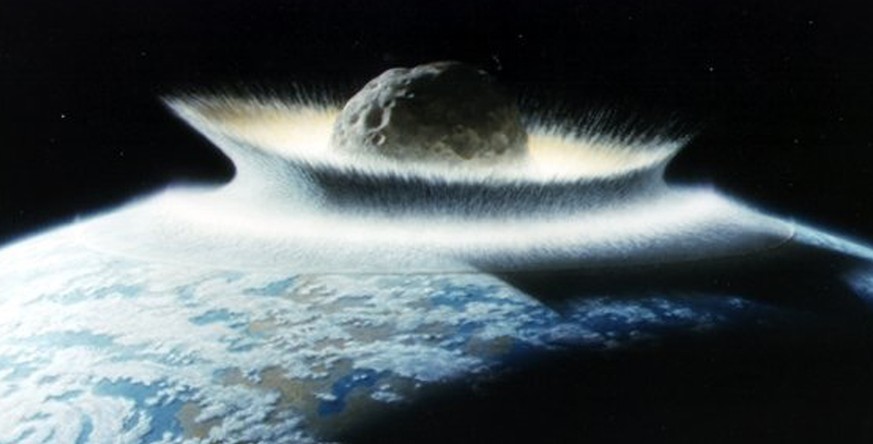 Ein Asteroid schlägt auf der Erde ein.