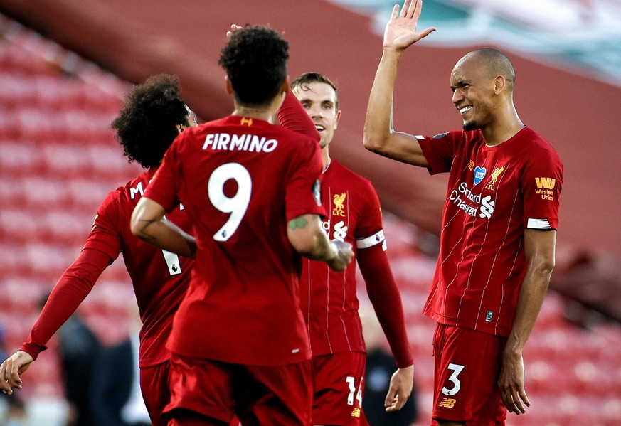 epa08507273 Liverpool&#039;s Fabinho (R) celebrates with his teammates after scoring the 3-0 lead during the English Premier League match between Liverpool FC and Crystal Palace in Liverpool, Britain, ...