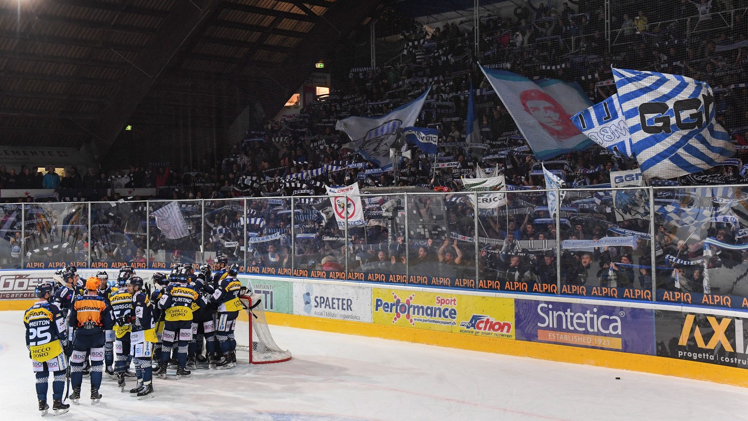 Ambri&#039;s players and fans celebrate the victory of the regular season game of National League Swiss Championship 2017/18 between HC Ambri Piotta and HC Davos, at the ice stadium Valascia in Ambri, ...