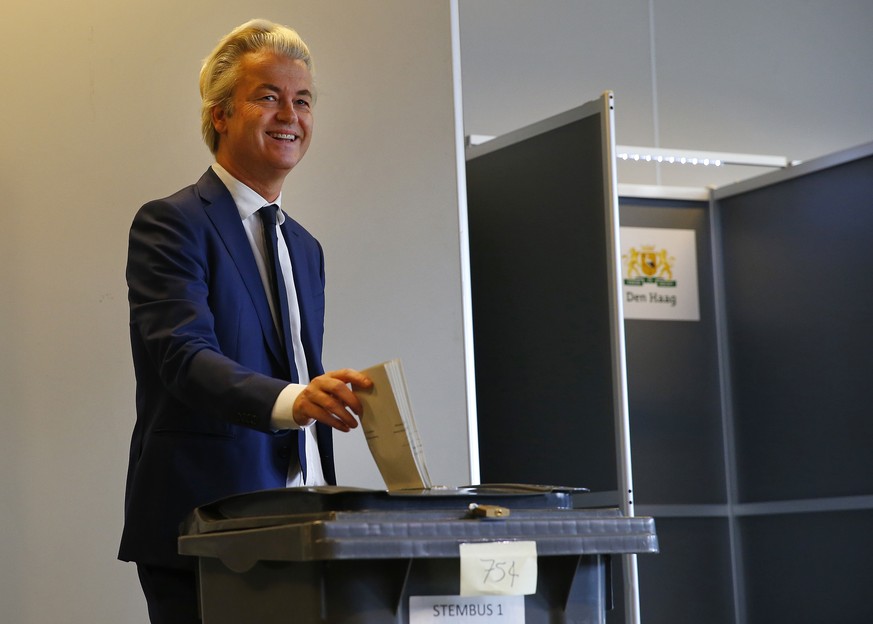 Geert Wilders casts his vote for the Dutch general election in The Hague, Netherlands, Wednesday, March 15, 2017. (AP Photo/Peter Dejong)