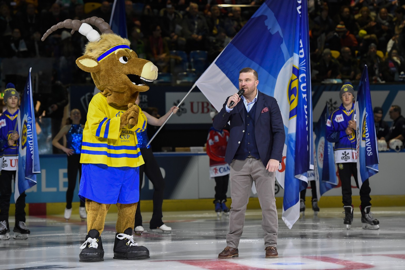 Mascotte Hitsch and oc president Marc Gianola prior the game between HC Ambri-Piotta and Salavat Yulaev Ufa, at the 93th Spengler Cup ice hockey tournament in Davos, Switzerland, Thursday, December 26 ...