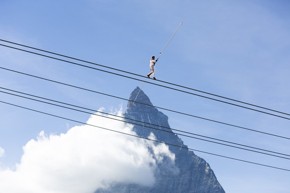 Freddy Nock, tightrope walker, in front of Matterhorn mountain during the inauguration ceremony of the new 3S ropeway on Saturday, September 29, 2018, in Zermatt, Valais, Switzerland. After three summ ...
