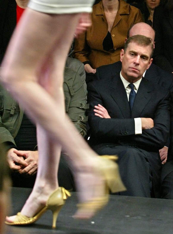 Britain&#039;s Prince Andrew, Duke of York, attends a fashion presentation by Matthew Williamson, as part of Moscow Fashion Week, Tuesday 26 October 2004. Prince Andrew is in Russia on a three-day vis ...
