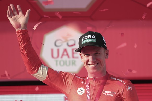 Germany&#039;s Pascal Ackermann of Bora-Hansgrohe team celebrates after he won the first stage of the UAE cycling tour in Dubai, United Arab Emirates, Sunday, Feb, 23, 2020. (AP Photo/ Mahmoud Khaled)