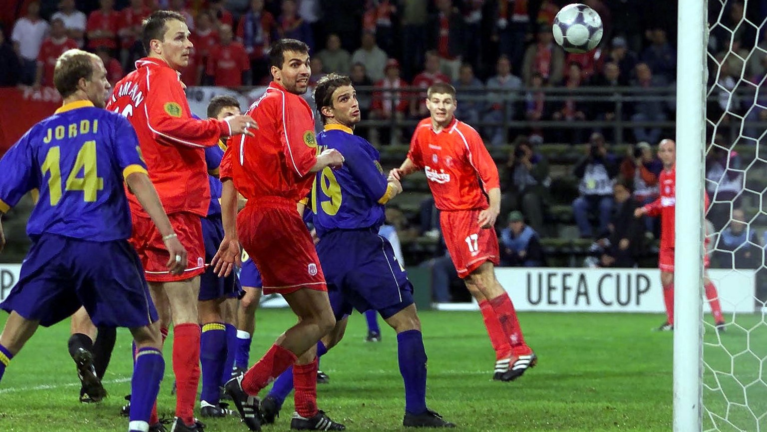 Players watch the ball go into the net, an own goal by Delfi Geli, to give Liverpool a 5-4 victory against Deportivo Alaves, Spain, during the UEFA Cup final in Dortmund, Germany, on Wednesday, May 16 ...