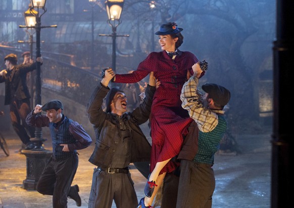 This image released by Disney shows Emily Blunt as Mary Poppins in &quot;Mary Poppins Returns.&quot; (Jay Maidment/Disney via AP)