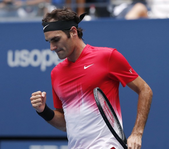 Roger Federer, of Switzerland, reacts after scoring a point against Mikhail Youzhny, of Russia, during the second round of the U.S. Open tennis tournament, Thursday, Aug. 31, 2017, in New York. (AP Ph ...