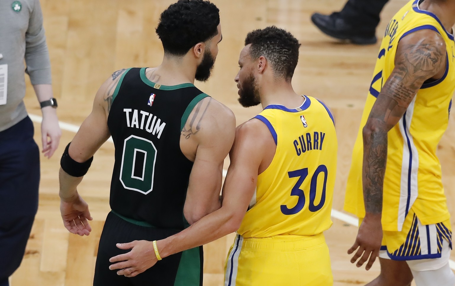 Boston Celtics&#039; Jayson Tatum (0) and Golden State Warriors&#039; Stephen Curry (30) talk following an NBA basketball game, Saturday, April 17, 2021, in Boston. (AP Photo/Michael Dwyer)
Jayson Tat ...