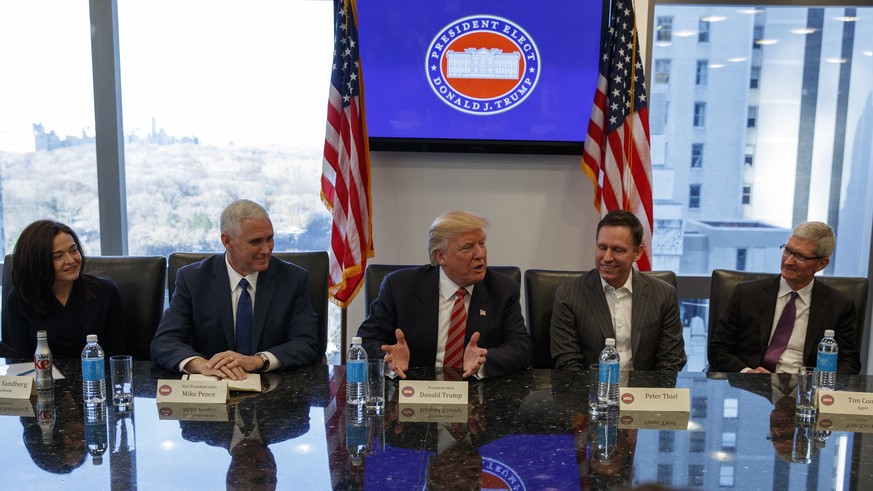 President-elect Donald Trump speaks during a meeting with technology industry leaders at Trump Tower in New York, Wednesday, Dec. 14, 2016. From left are, Facebook COO Sheryl Sandberg, Vice President- ...