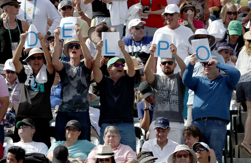 epa06613502 Fans of Juan Martin Del Potro from Argentina hold up letters that spell &#039;DEL PO&#039; during his finals match against Roger Federer from Switzerland at the BNP Paribas Open at the Ind ...