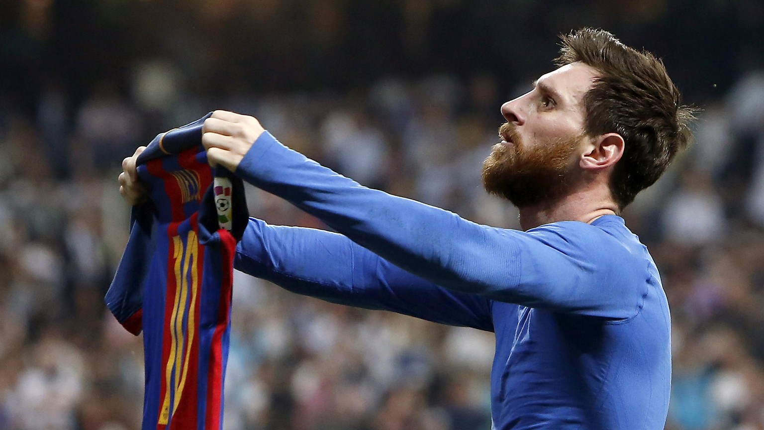 epa05924571 FC Barcelona&#039;s Argentinian striker Lionel Messi jubilates the 3-2-victory against Real Madrid during the Liga Primera Division 33rd round match between Real Madrid and FC Barcelona at ...