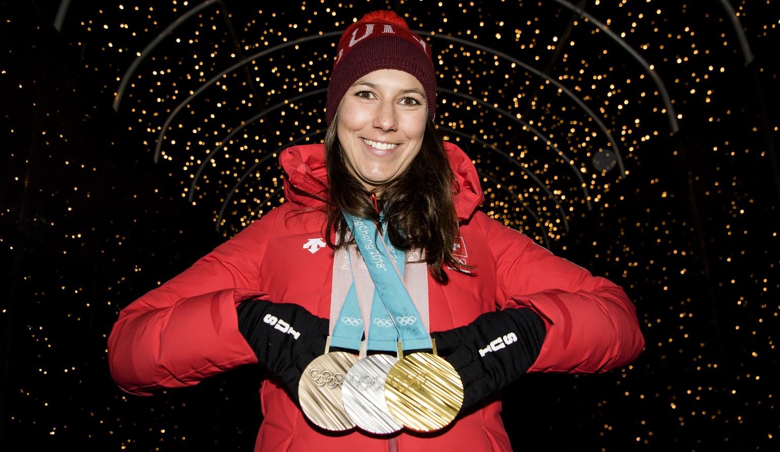Wendy Holdener of Switzerland poses with the Gold, Silver and Bronze medals at the House of Switzerland after the Alpine Skiing Team event during the XXIII Winter Olympics 2018 in Pyeongchang, South K ...