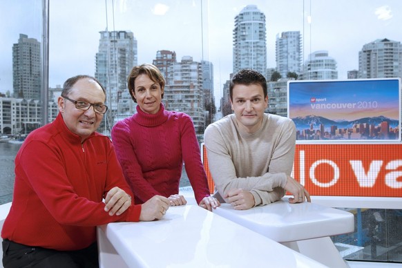 Bernard Thurnheer, left, Regula Spaeni, middle, and Paddy Kaelin, right, standing in the swiss tv studio in the house of switzerland in vancouver before the opening of the XXI Olympic Winter Games in  ...