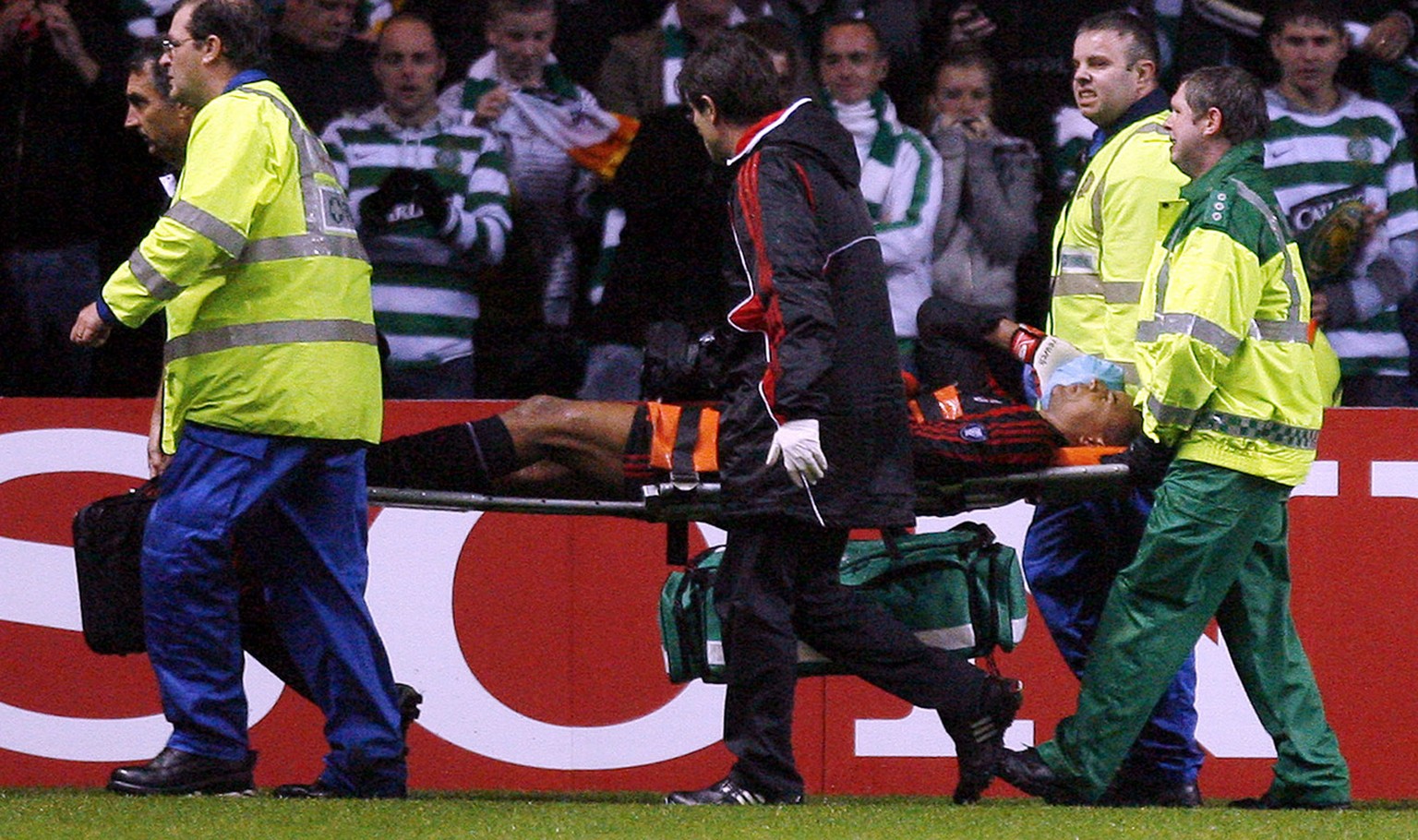 AC Milan&#039;s goalkeeper Dida is carried off after an incident with a Celtic fan during their Champions League, Group D, soccer match at Celtic Park, Glasgow, Scotland, Wednesday Oct. 3, 2007. (AP P ...