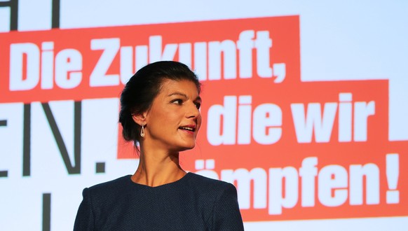 epa06224425 Sahra Wagenknecht, The Left (Die Linke) party parliamentary group co-leader and co-top candidate for the general elections, reacts to the first prognosis of German federal election at the  ...
