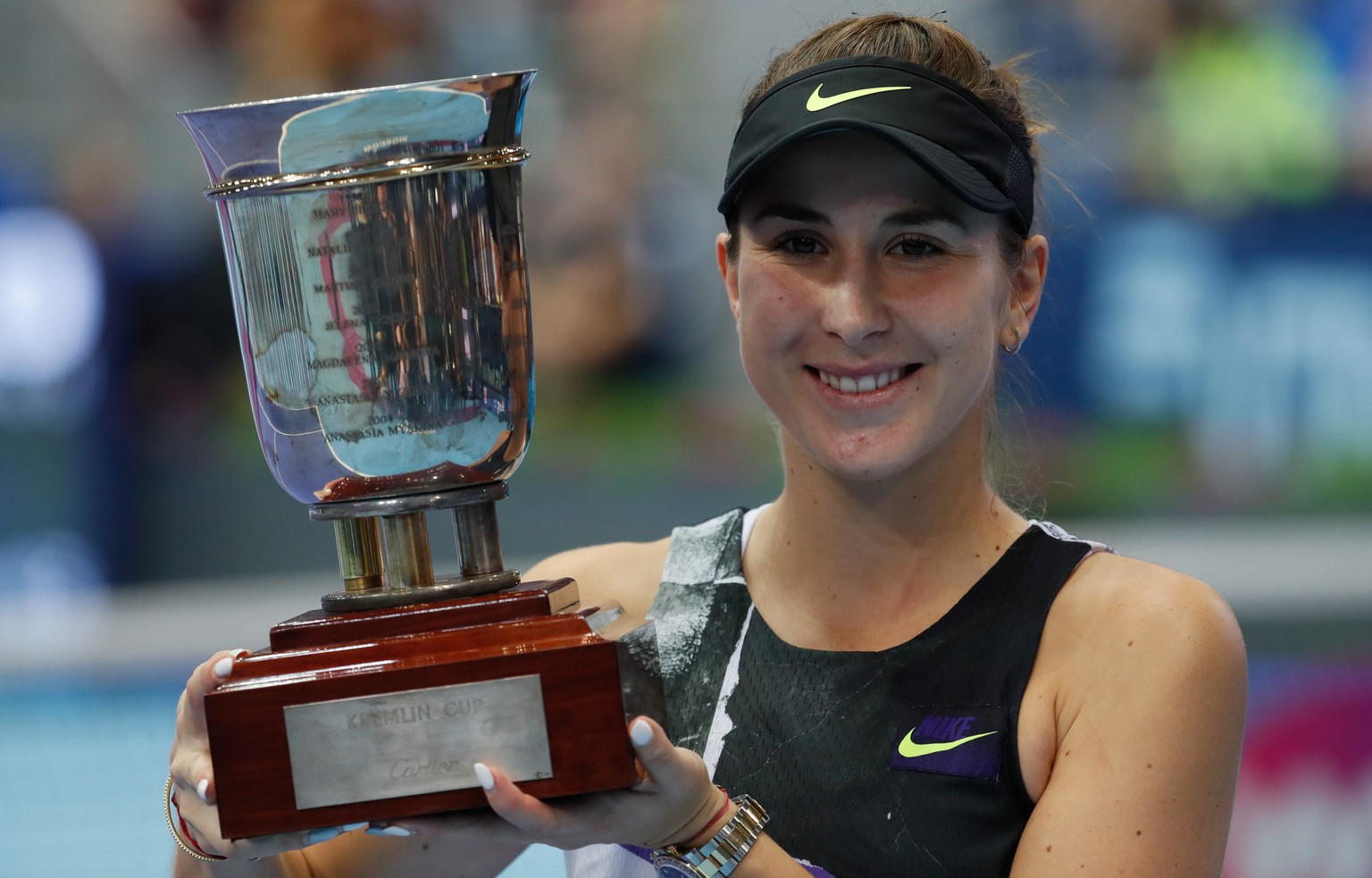 epa07936789 Belinda Bencic of Switzerland poses with her trophy after winning the women&#039;s singles final match at the Kremlin Cup tennis tournament in Moscow, Russia, 20 October 2019. EPA/YURI KOC ...