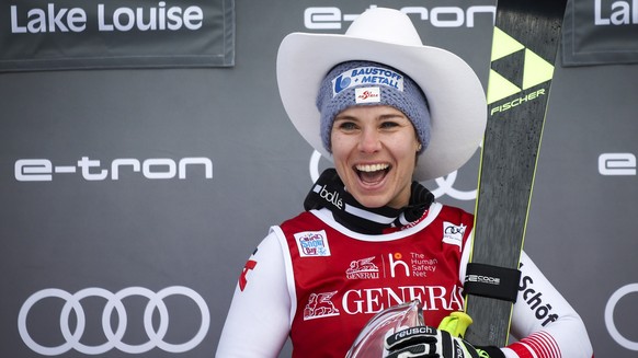 Austria&#039;s Nicole Schmidhofer celebrates her win in the women&#039;s World Cup downhill ski race, Saturday, Dec. 7, 2019 in Lake Louise, Alberta. (Jeff McIntosh/The Canadian Press via AP)
