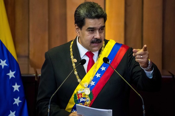 epa07273790 President of Venezuela Nicolas Maduro delivers a speech after being sworn-in for the second term, in Caracas, Venezuela, 10 January 2019. Maduro took the second term oath of office before  ...
