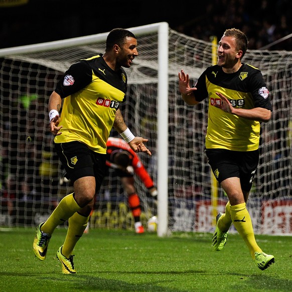 WATFORD, ENGLAND - APRIL 08: Almen Abdi of Watford (R) cekebrates scoring the opening goal of the game during the Sky Bet Championship match between Watford and Leeds United at Vicarage Road on April  ...