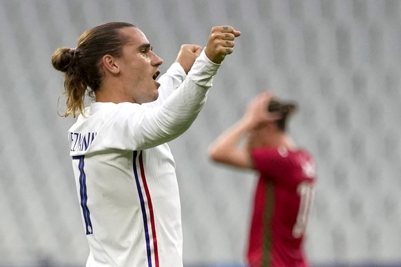 France&#039;s Antoine Griezmann, left, celebrates his goal against Bulgaria during the international friendly soccer match between France and Bulgaria at the Stade De France in Saint Denis, North of P ...