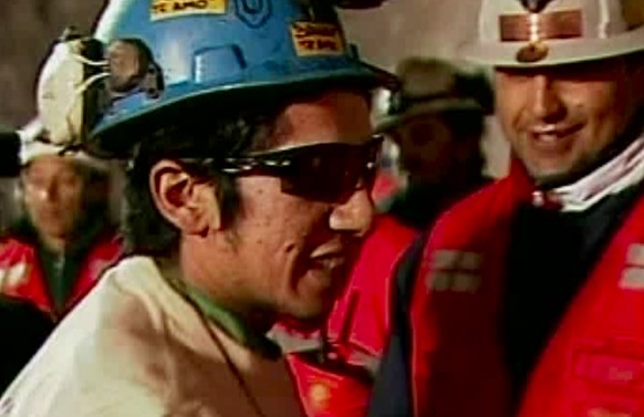 FILE - This Oct. 13, 2010 file photo of a screen grab taken from video, shows miner Jimmy Sanchez, the fifth miner to be rescued at the San Jose mine where 33 miners had been trapped for 69 days, near ...