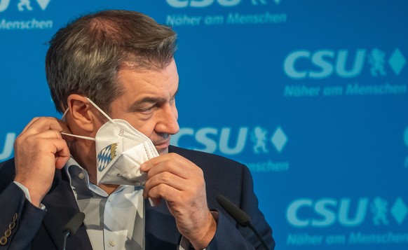 epa09146732 Bavarian State Premier Markus Soeder attends a press conference in Munich, Germany, 20 April 2021. Soeder said he accepted the CDU board&#039;s vote to choose North Rhine-Westphalia&#039;s ...