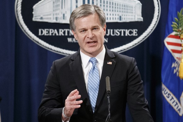 epa07122159 FBI Director Christopher Wray joins US Attorney General Jeff Sessions and delivers remarks on the apprehension and arrest of mail bomb suspect Cesar Sayoc jr. during a press conference at  ...