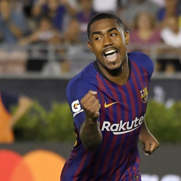 CORRECTS PLAYER&#039;S NAME TO MALCOM INSTEAD OF CARLES ALENA - Barcelona midfielder Malcom celebrates his game-winning penalty kick during the shootout in an International Champions Cup tournament so ...