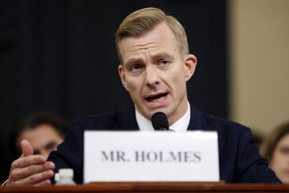 David Holmes, a U.S. diplomat in Ukraine, testifies before the House Intelligence Committee on Capitol Hill in Washington, Thursday, Nov. 21, 2019, during a public impeachment hearing of President Don ...